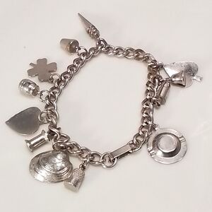 Silver tone charm bracelet